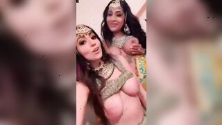 yasmina khan and other girl in cultural clothing talking